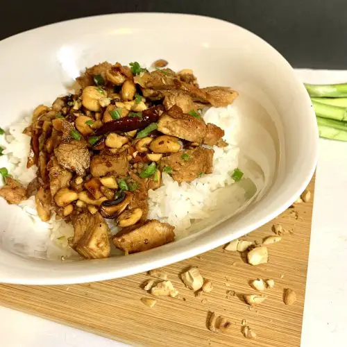 cashew chicken with rice and green onion